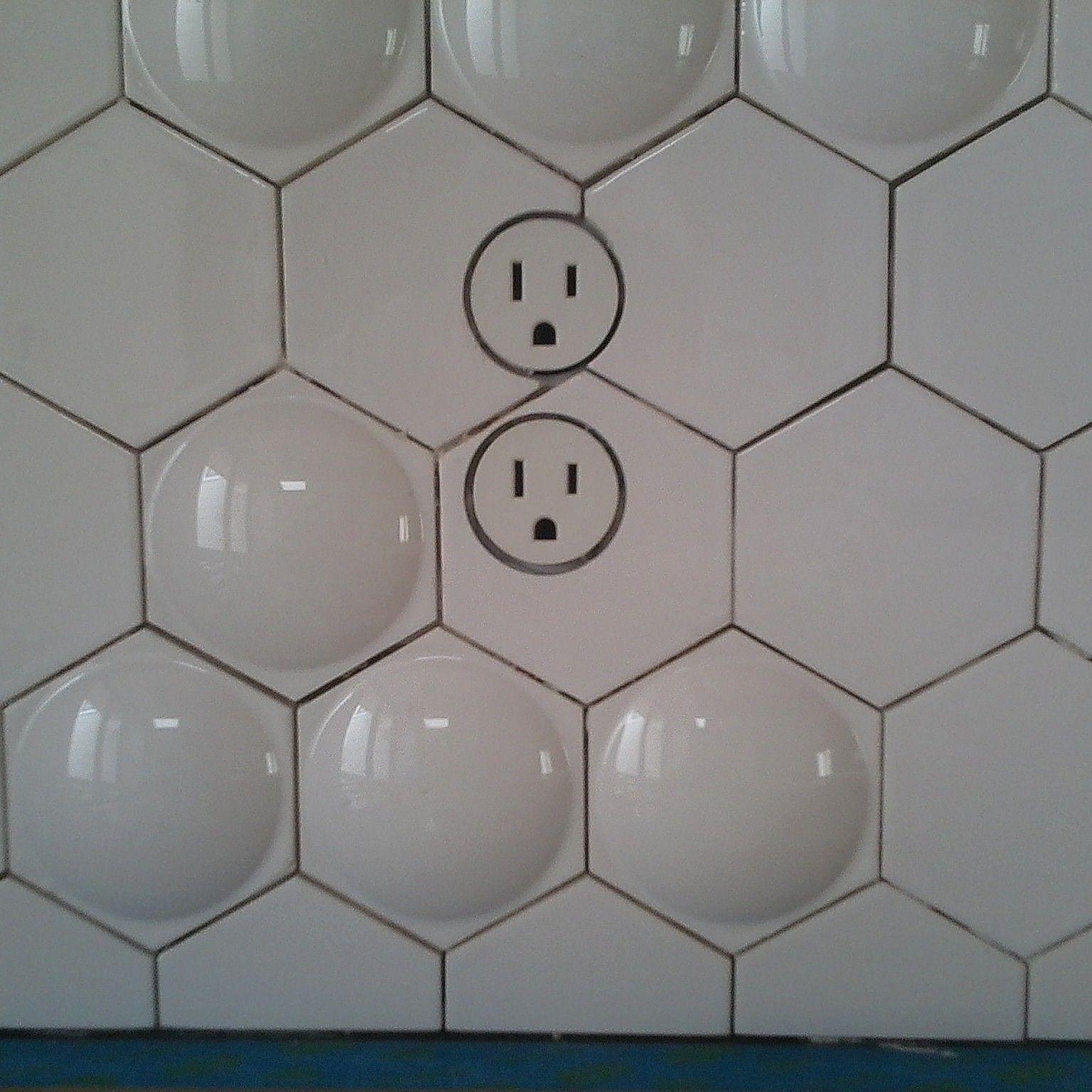 Bocci hidden outlets in wall