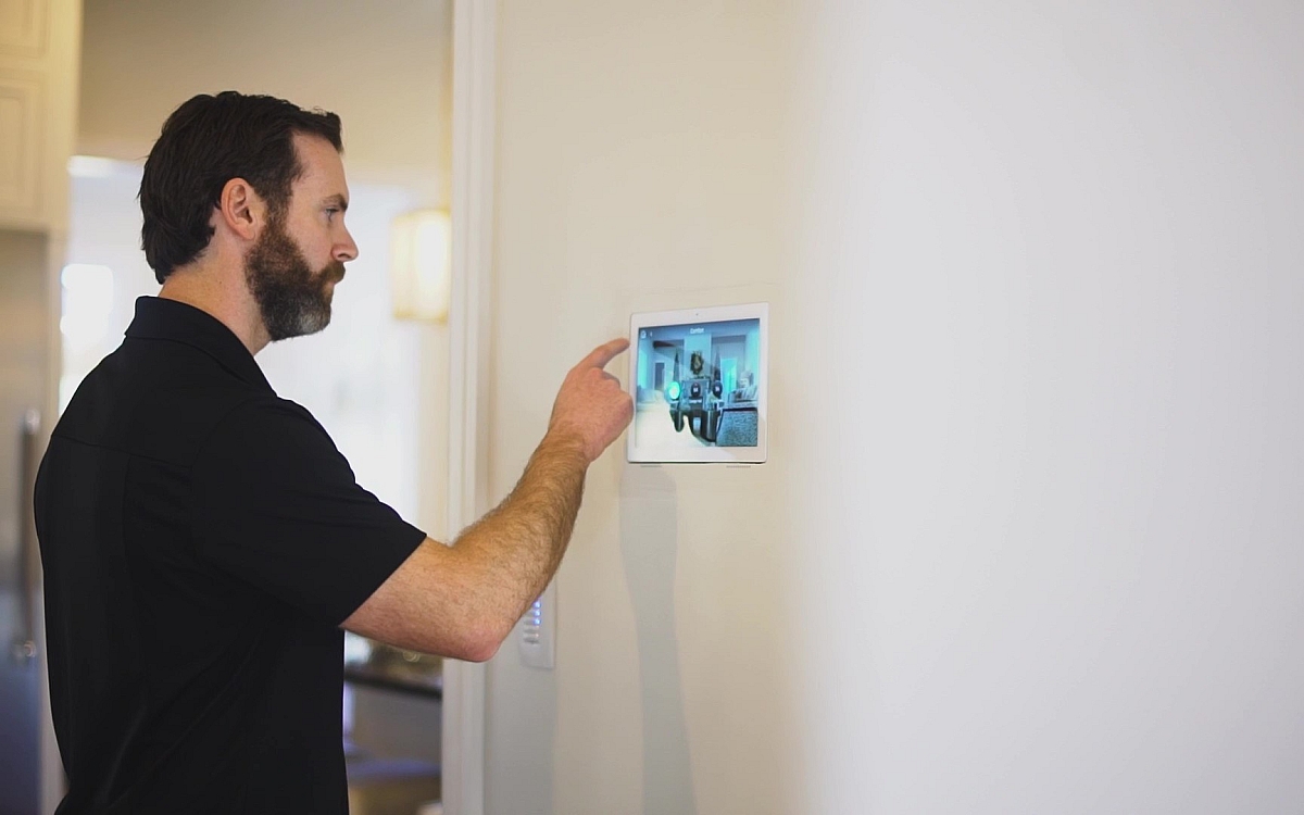 control4 ipad in wall with miestro employee