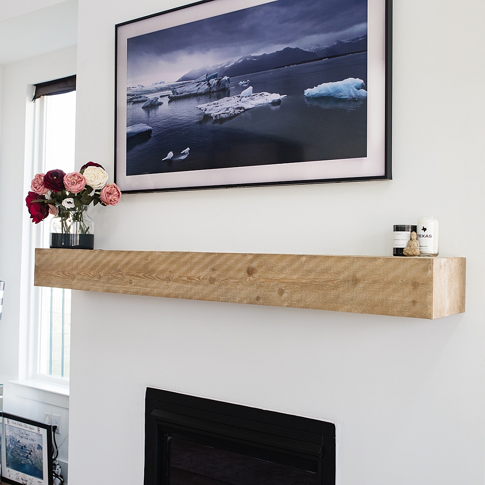 Samsung frame tv above fireplace
